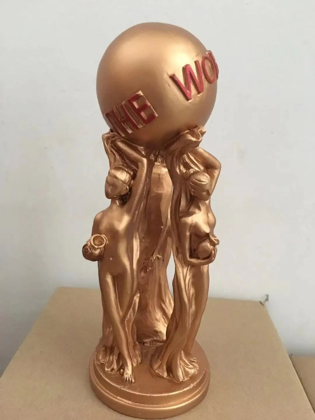 The World Is Yours Statue